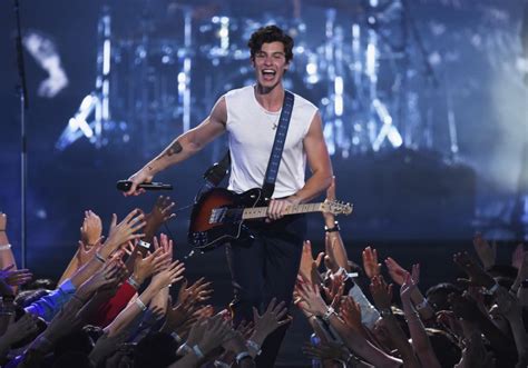 The Shawn Mendes Concert: A Night of Passionate Vocals and Unexpected Wardrobe Malfunction!